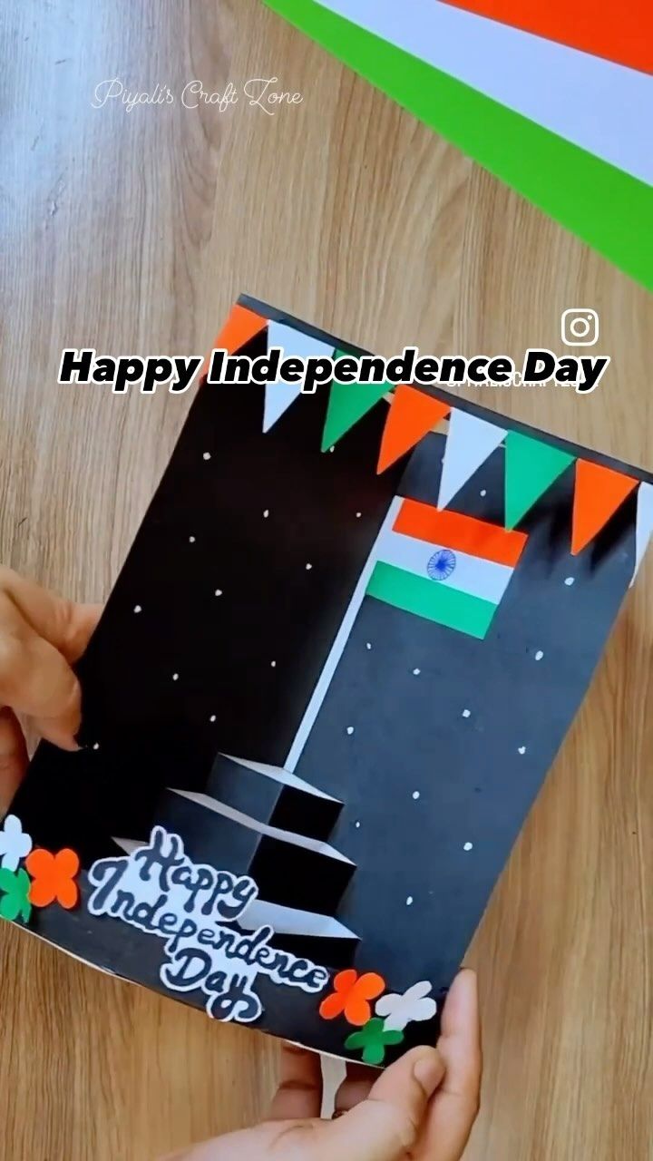 someone is holding up a card that says happy independence day