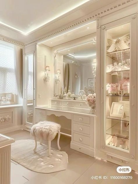 an elegant white dressing room with large mirror