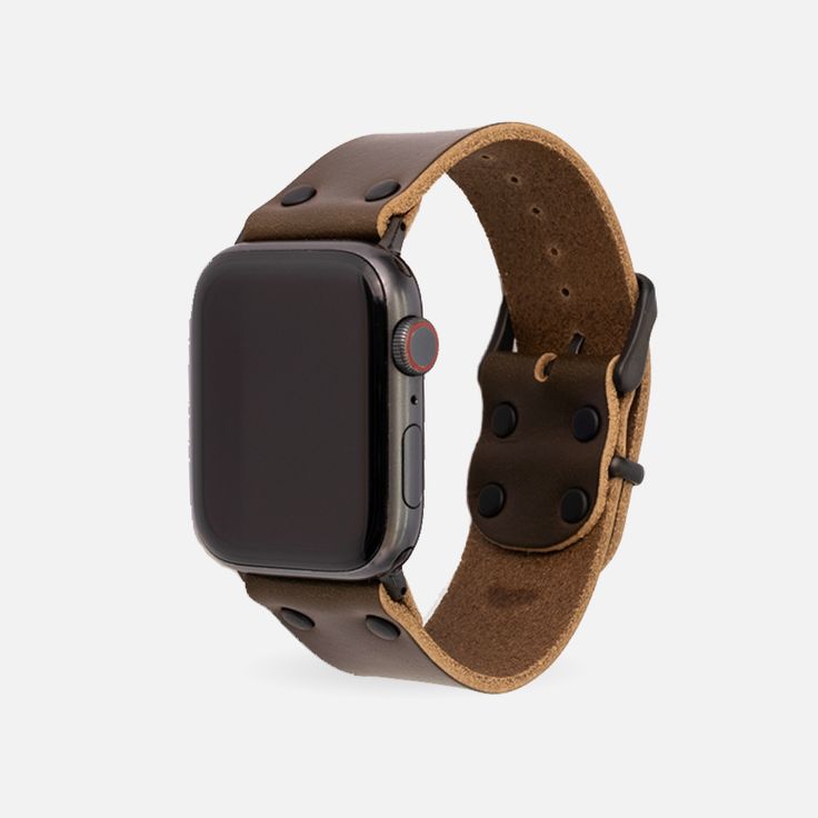 Inspired by the rugged leather straps of history, our American-made Apple Watch bands are hand pounded with care and attention to detail. Crafted from a single piece of full grain leather, they will continue to look better with age, unbending from the trends that come and go. Our leather Apple Watch bands are carefully crafted to fit all Apple Watch models, including the latest Series 10 and Apple Watch Ultra 2. Designed for universal compatibility, our bands provide both style and functionality Vintage Leather Strap Watch Bands For Everyday Use, Vintage Leather Watch Accessories For Everyday Use, Vintage Leather Watch With Bracelet Strap, Masculine Brown Leather Watch, Vintage Leather Watch Bands With Waxed Finish, Adjustable Vegetable Tanned Leather Watch Bands With Strap, Adjustable Vegetable Tanned Leather Watch Band, Adjustable Vegetable-tanned Leather Watch Bands, Rugged Watch Accessories With Leather Strap For Everyday Use