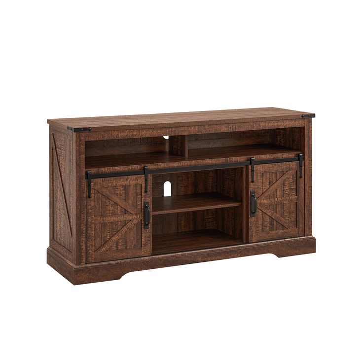 a wooden entertainment center with sliding doors