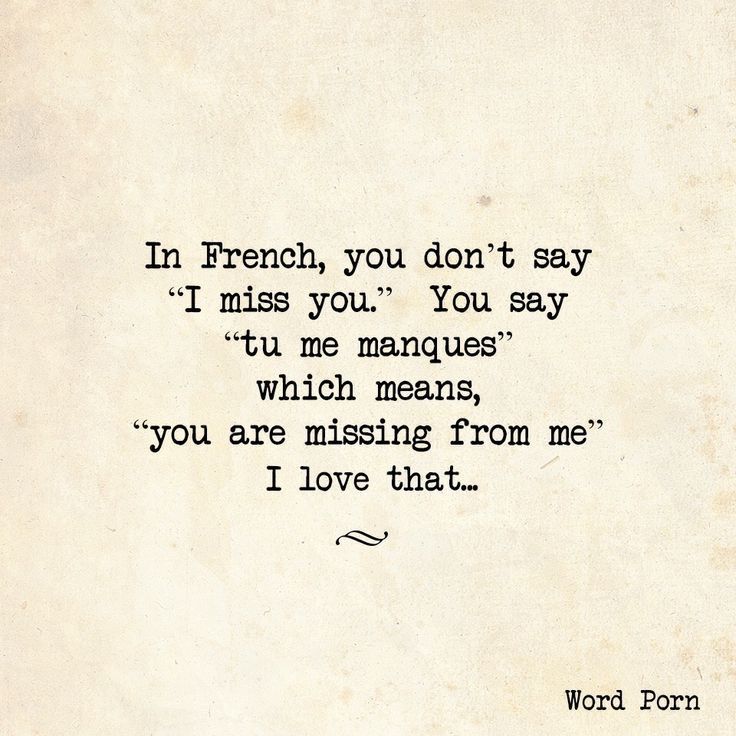 an old typewriter with the words in french, you don't say i miss you