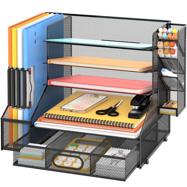 an office desk organizer with many compartments and supplies on it, including pens, pencils, books, and notebooks