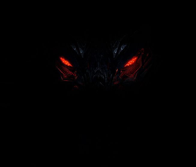 the face of a black cat with red eyes in the dark, glowing from behind