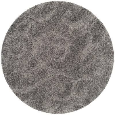 a round gray rug on a white background