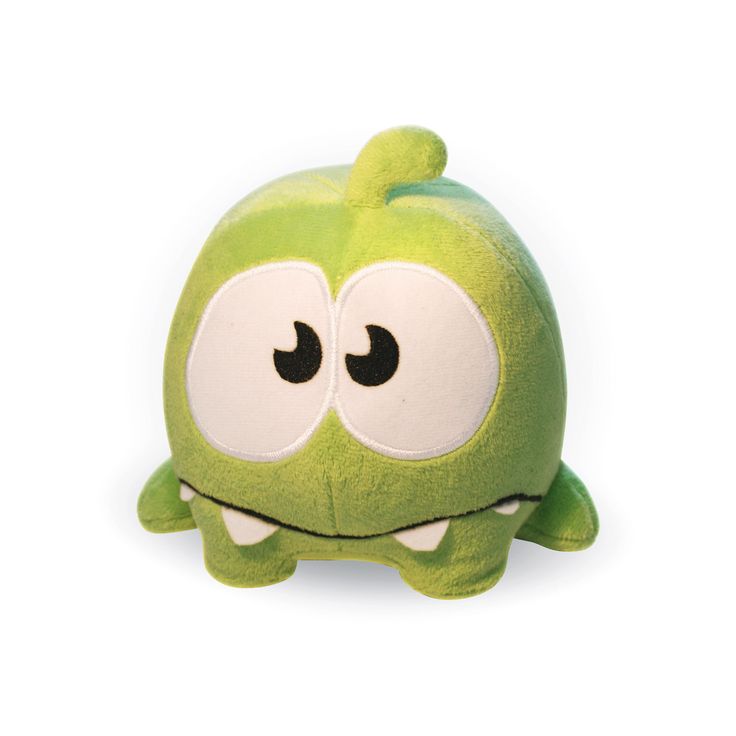 a green stuffed animal with big eyes