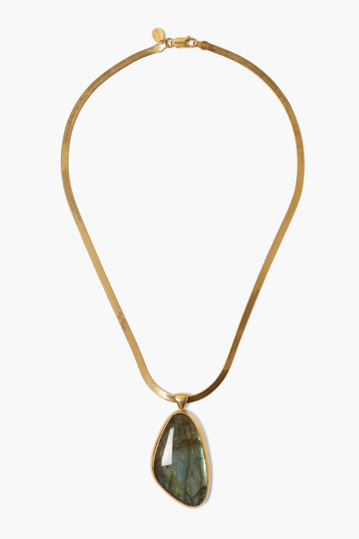 A luxurious labradorite pendant hangs from a sleek gold herringbone chain. A statement design perfect to wear on its own. 18k gold plated sterling silver, labradorite. 16" in length. Handmade in Vietnam. Gold Herringbone Chain, Herringbone Chain, Gold Statement Necklace, Stacked Jewelry, Labradorite Pendant, Jewelry Business, Toe Rings, Gold Plated Sterling Silver, Necklace Gold