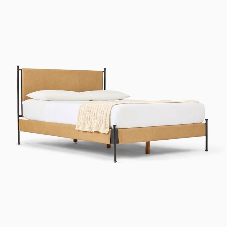 an image of a bed that is made with wood and metal frame, on a white background