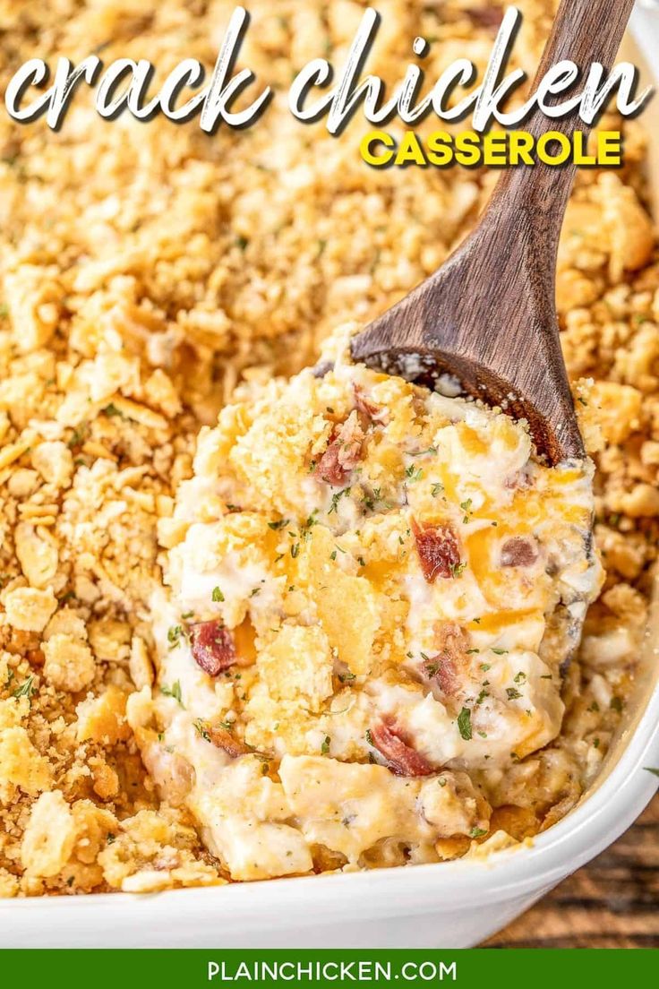 a casserole dish filled with chicken and crumbled cheese