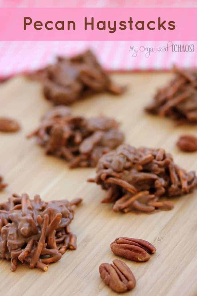 chocolate pecan haystacks on a wooden cutting board