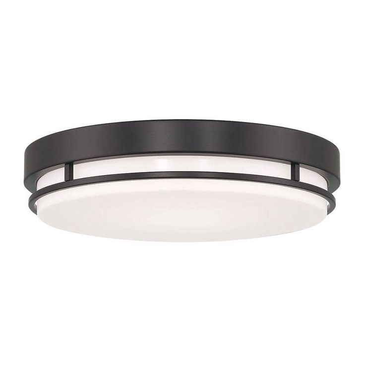 a round light fixture on a white background