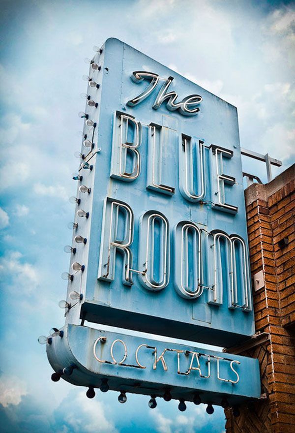 black and white photograph of the blue room sign