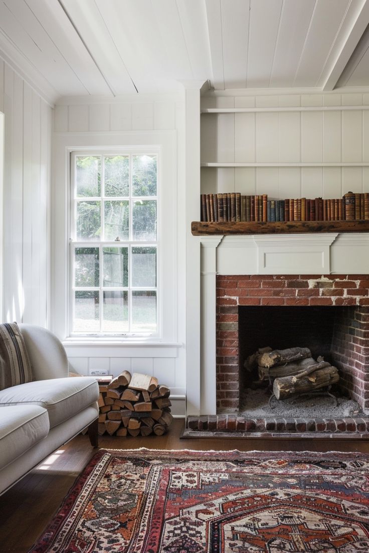 a living room filled with furniture and a fire place in front of a brick fireplace