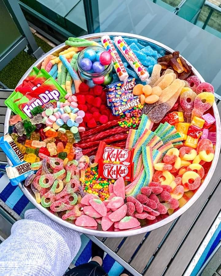 a large bowl filled with lots of candy and candies