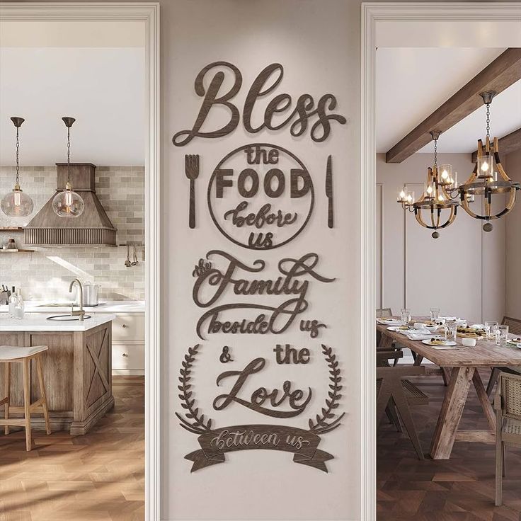 a kitchen with a large wall decal that says, blessing the food is family and love