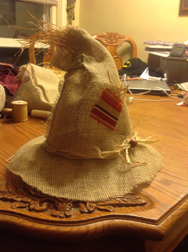 a hat sitting on top of a wooden table