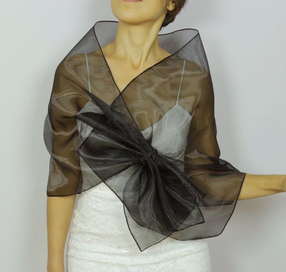 Black organza shawl, Shoulder wrap scarf, Mesh evening dress topper, Pull through mother of the bride stole, Hands free formal cover upIt's made with black organza fabric.A detail is added to be able to use it "hands-free".Rectangular shaped, it measures approximately 18.5’’x56.7’’ (47x144 cm)Size: SWith its elegant and refined look, it can be worn during the day at the office or at a cocktail reception etc.For more similar wedding & evening cover-ups, please kindly visithttps://www.etsy.com Ponchos, Couture, Haute Couture, Cover Up For Dress Formal, Organza Shawl, Tulle Shawl, Dress Topper, Women Suits Wedding, Evening Scarf