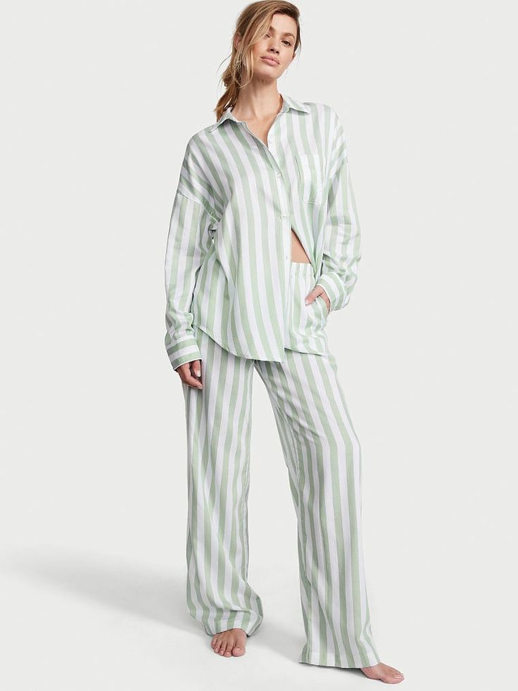 Crafted in an ultra-soft modal-cotton blend, these classic PJs are what dreams are made of. Oversized fit Long sleeve, button-front top hits at hips Chest pocket Pants with elastic waist Soft, plant-derived modal fibers, sourced from sustainably managed forests Machine wash Imported Womens Pj Sets, Long Pyjamas, Lingerie Catalog, Bridesmaid Pyjamas, Victoria Secret Pajamas, Pajamas Gift, Pajamas Sets, Cami Set, Striped Pyjamas