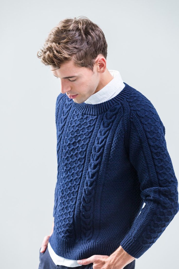 A handsomely cabled pullover is never out of style, and a long-wearing mid-weight yarn is the perfect choice for a sweater to see you through the decades. At first glance, Svenson appears to be composed of traditional Aran motifs, but the honeycomb texture of the central panels incorporates purl stitches to unusual eff Pola Sweater, Cable Sweaters, Blue Cable Knit Sweater, Mens Knit Sweater, Knit Sweater Outfit, Brooklyn Tweed, Sweater Outfit, Knit Men, Cable Sweater