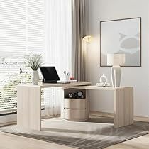 a desk with a laptop on it in front of a window and a lamp next to it