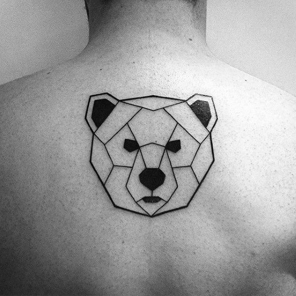 a man with a bear tattoo on his back