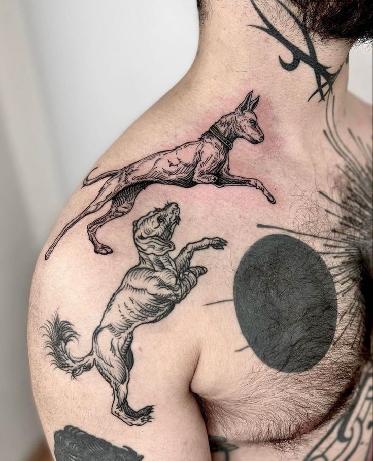 a man with tattoos on his chest is wearing a horse and dog tattoo design around his neck