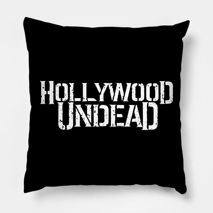 a black pillow with the words hollywood under - ad printed on it in white letters