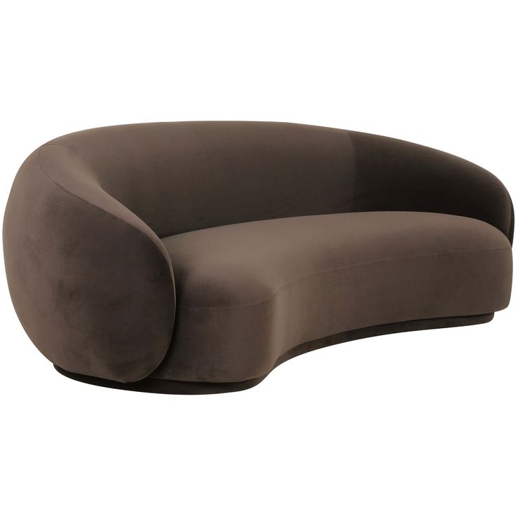 the curved sofa is made from fabric and has a rounded backrest, with an oval shaped