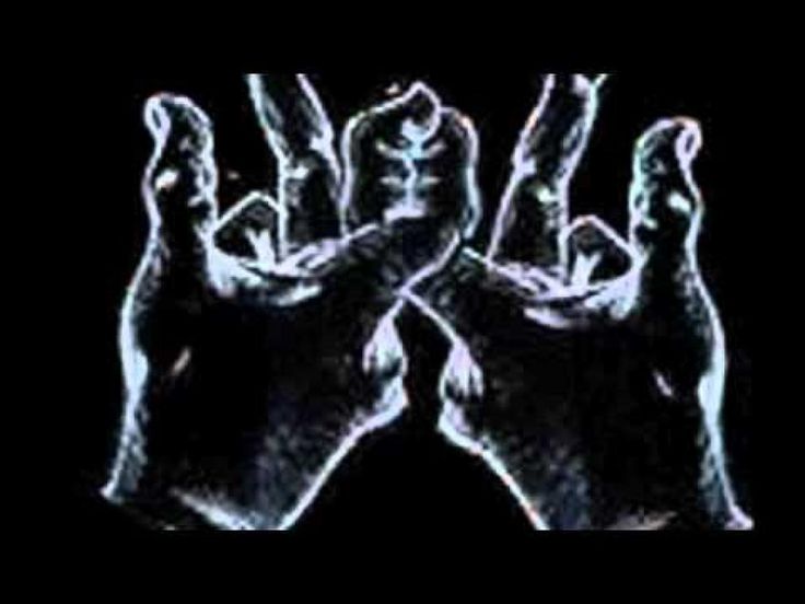 two hands reaching up to each other with their palms raised in front of the camera