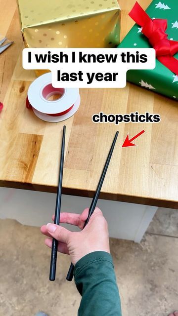 someone is holding two chopsticks in their hand with the words i wish i knew this last year