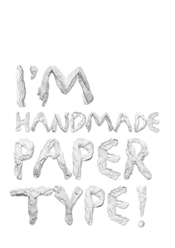 the words i'm handmade paper type are made out of crumpled white paper