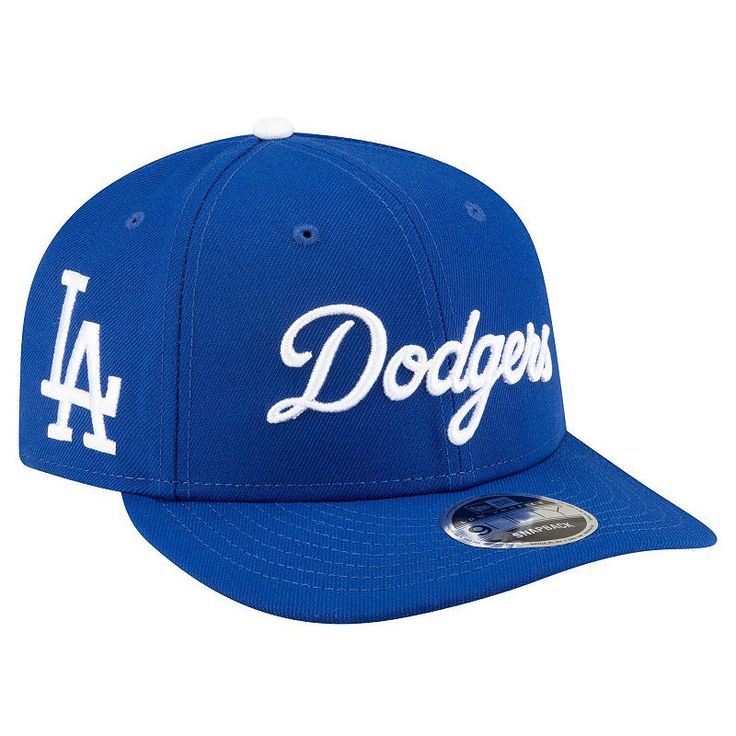 Express your passion for the Los Angeles Dodgers unapologetically when you sport this Low Profile 9FIFTY hat. Made by New Era in collaboration with Felt, it features a raised Los Angeles Dodgers wordmark across the front, the team logo embroidered on a side panel and a butterfly and bee embroidered on the back. A snap closure makes adjusting the fit quick and simple.Express your passion for the Los Angeles Dodgers unapologetically when you sport this Low Profile 9FIFTY hat. Made by New Era in co La Dodgers Fitted Hat, Blue Flat Brim Hat With Letter Print, Blue Sports Hat With Embroidered Logo, Blue Flat Bill Baseball Cap With Letter Print, Blue Baseball Cap For Spring Sports, Blue Snapback Hat With Letter Print, Blue Letter Print Snapback Hat For Baseball Season, Blue Spring Baseball Cap For Sports, Blue Letter Print Snapback Hat