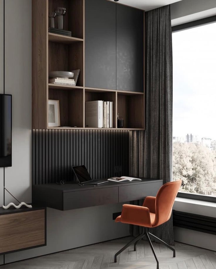 an office with a desk, chair and bookcase in front of a large window