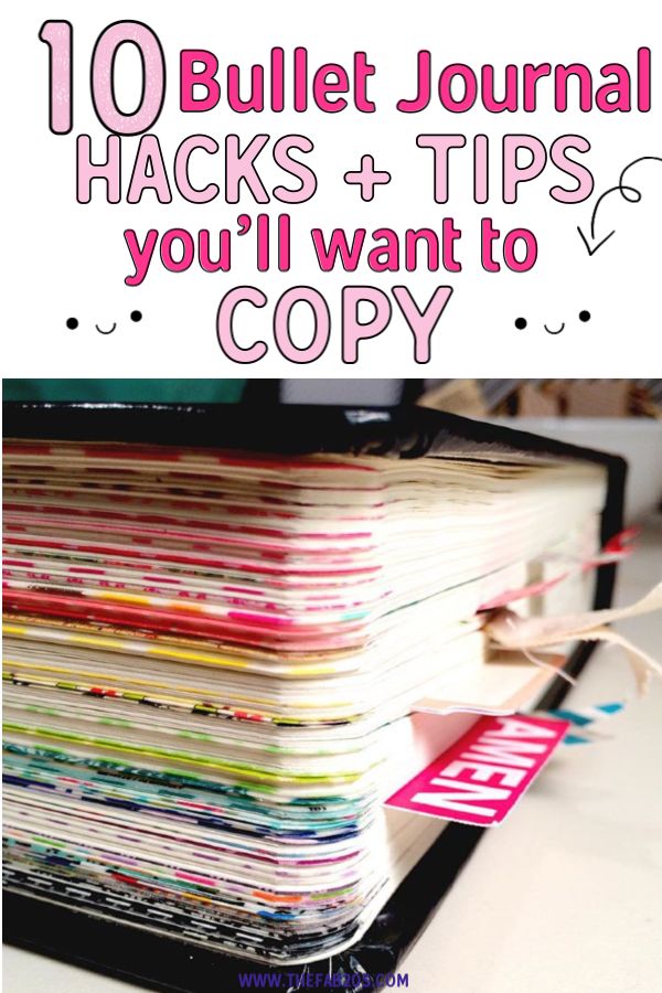 a stack of magazines sitting on top of a desk