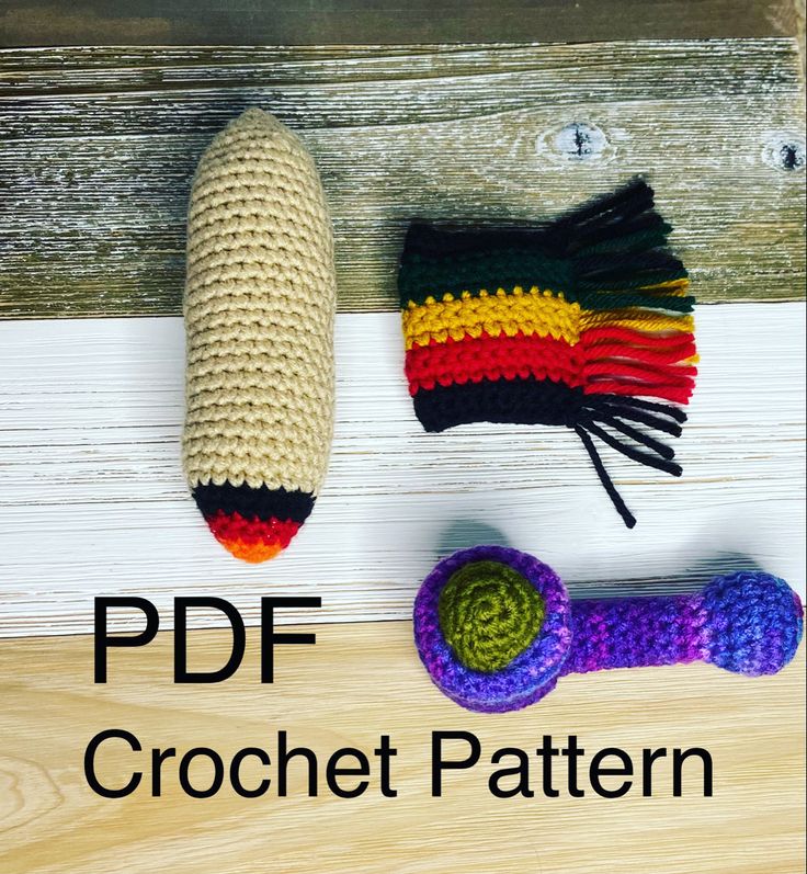 the crochet pattern is shown next to a knitted object on a wooden surface