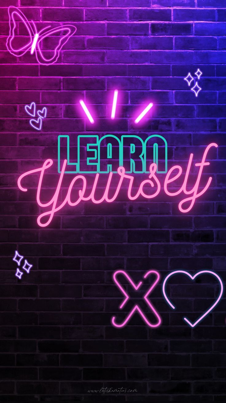 a neon sign that says learn yourself with butterflies and hearts on the side of a brick wall