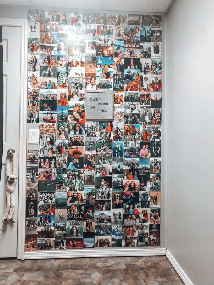 a wall with many pictures on it and a door in the middle that has a white frame