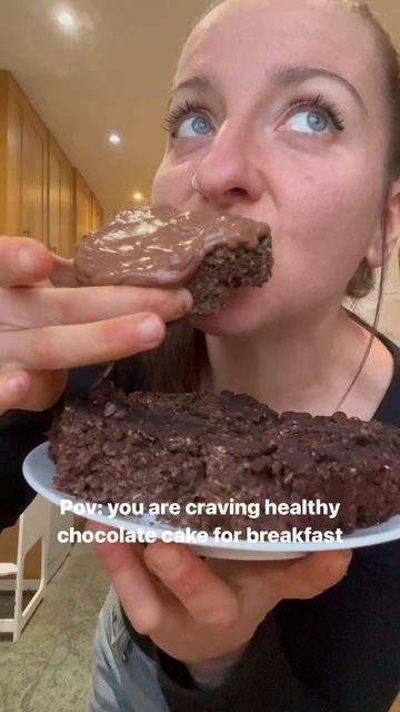 a woman eating a chocolate cookie with a quote on the side that says, if you are craveing healthy chocolate cookies and just break fast breakfast