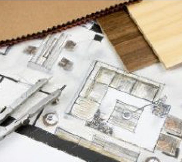 an overhead view of a floor plan with wood and metal parts on the top half