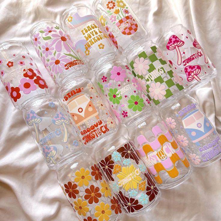 many different designs and colors are on the plastic containers that have been used for nail polish