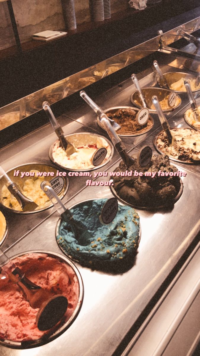 an assortment of desserts are on display in a buffet line with the words if you're ice cream, you would buy any flavor