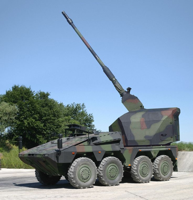 an army vehicle with a missile attached to it