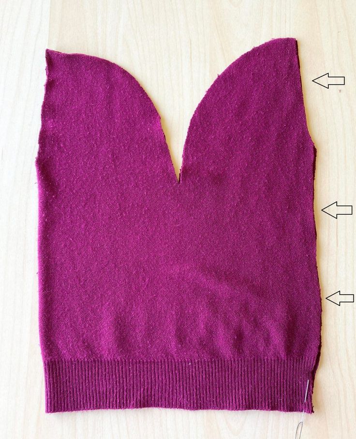 the top half of a purple sweater with measurements for it and how to sew