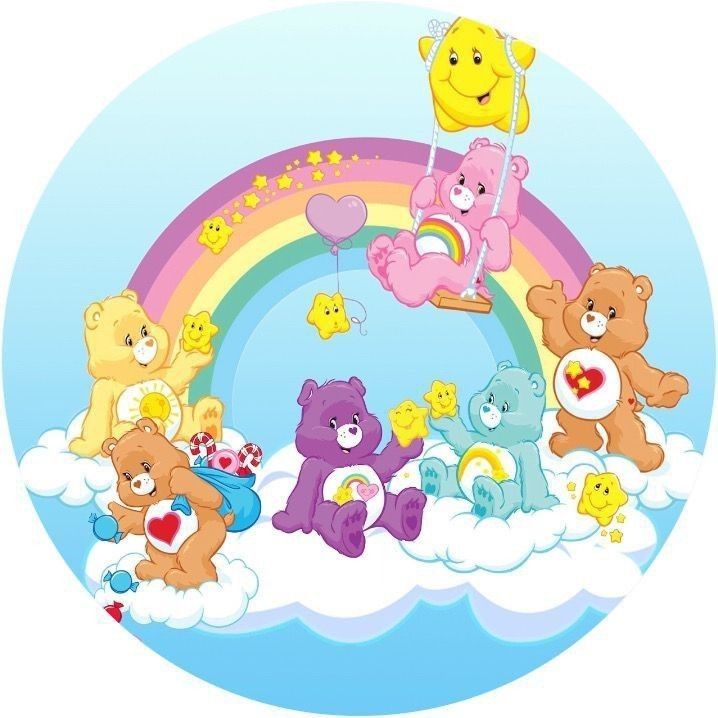 a group of teddy bears sitting on top of a rainbow