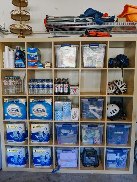 the shelves are filled with various items and supplies to be used as storage for bicycles