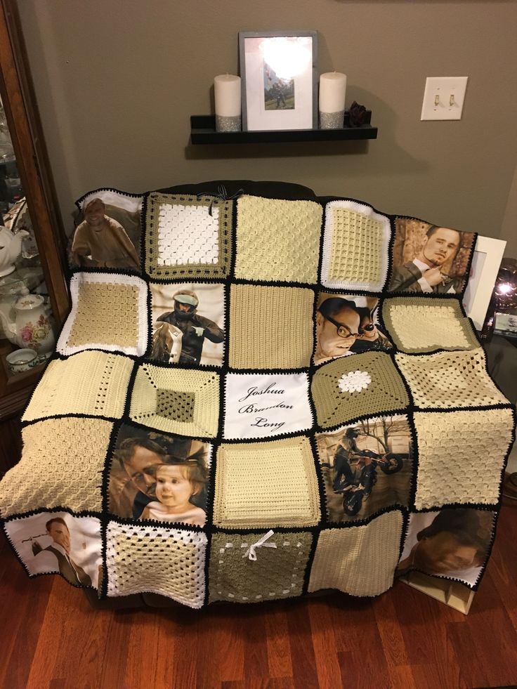 a blanket that has pictures on it in the middle of a room with wood floors