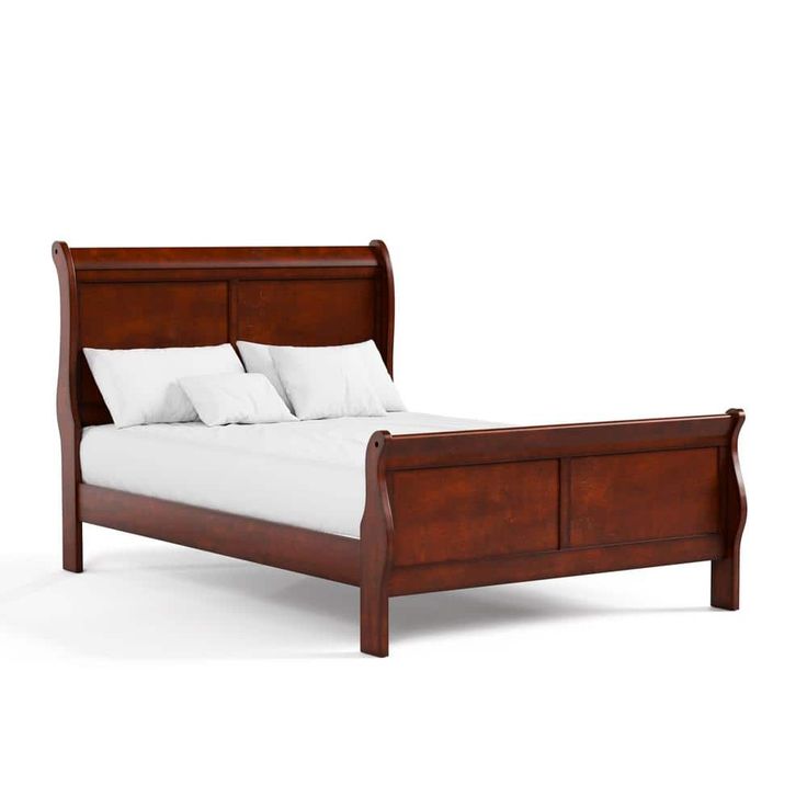 a wooden bed frame with white sheets and pillows