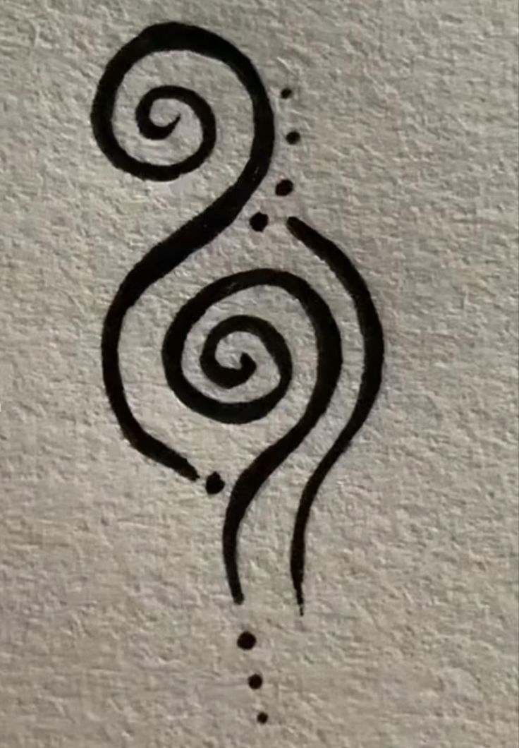 a black and white drawing of a swirly design on a piece of paper with dots