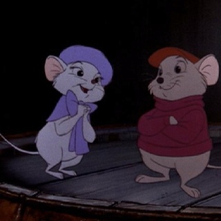 two cartoon mouses standing on top of a barrel in the middle of a dark room