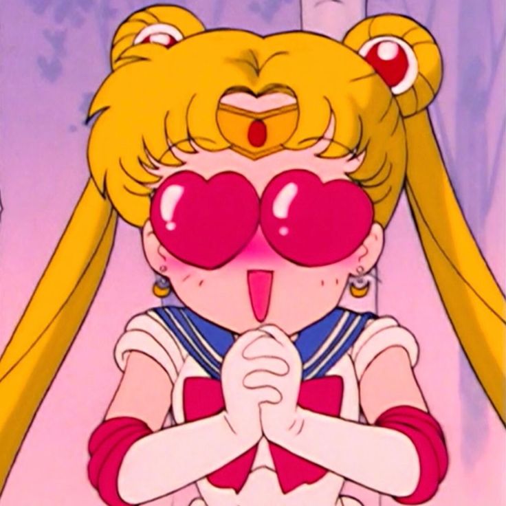 an anime character with her tongue out and heart shaped glasses over her eyes, looking at the camera