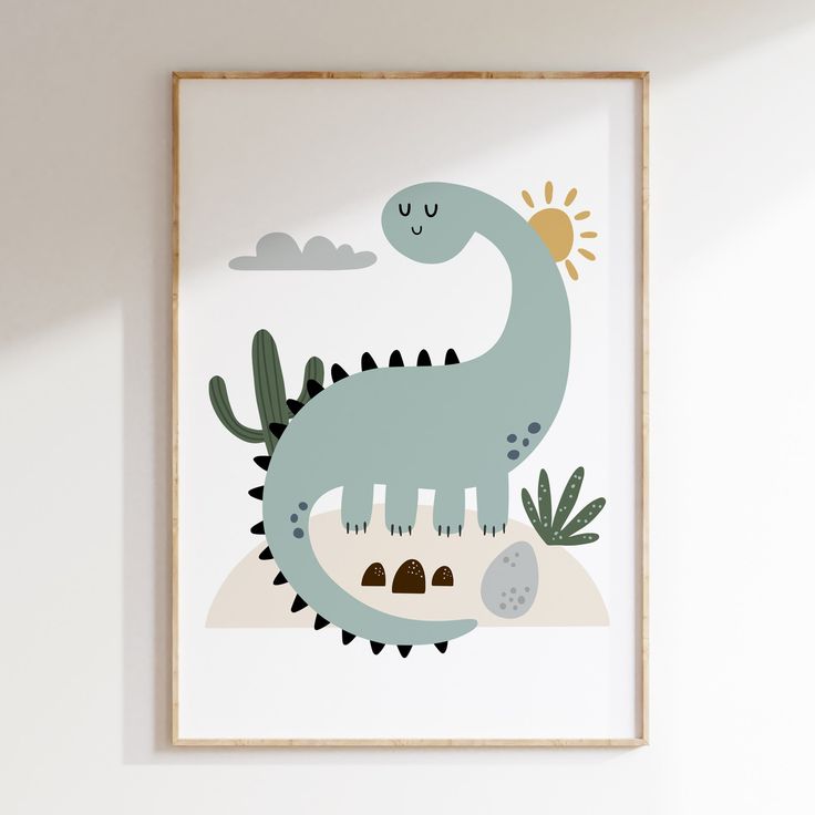 a green dinosaur print hangs on the wall next to a potted plant and rocks